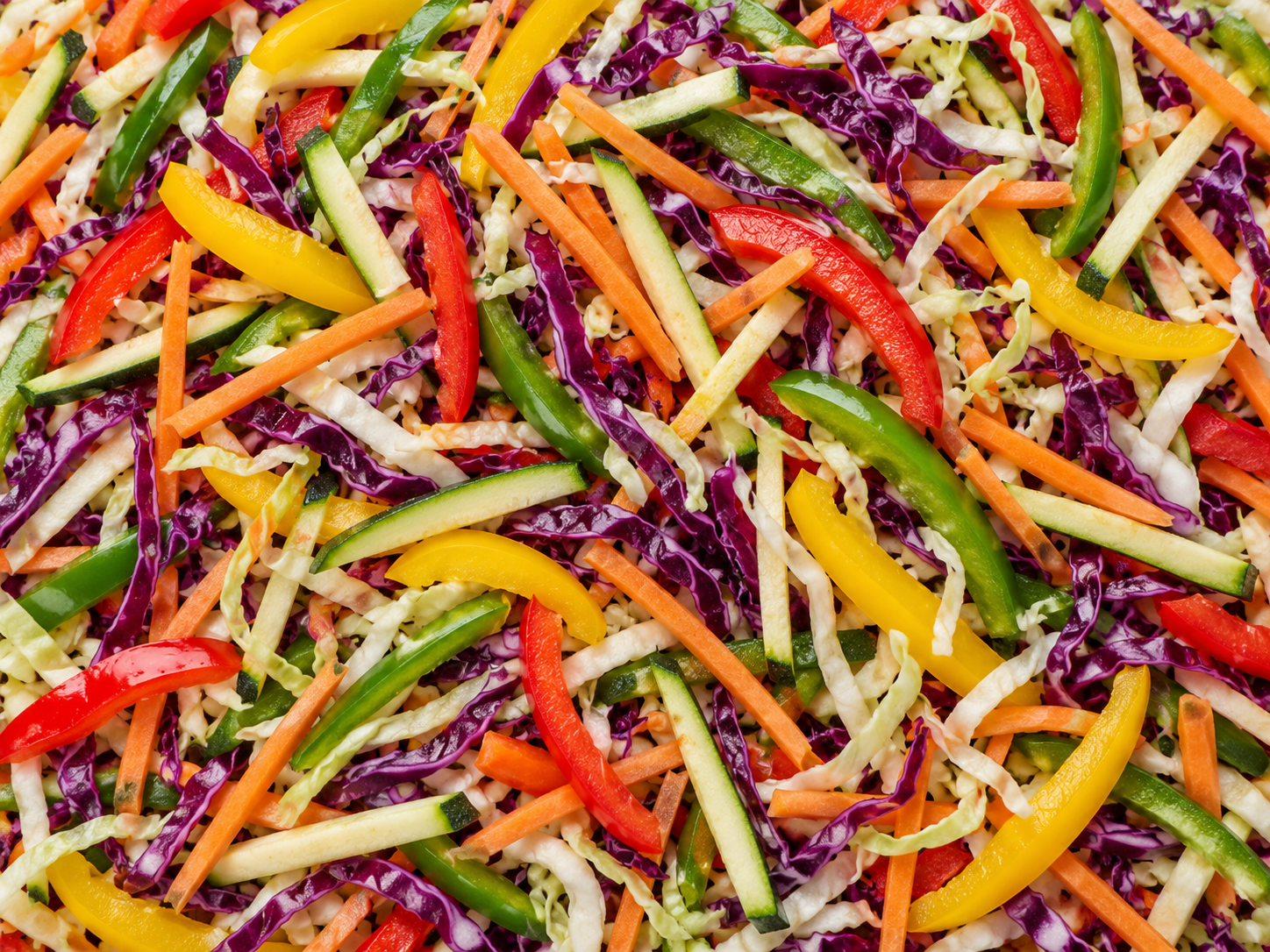 Mixed peppers, julienned baby marrow and carrots, and shredded red and white cabbage